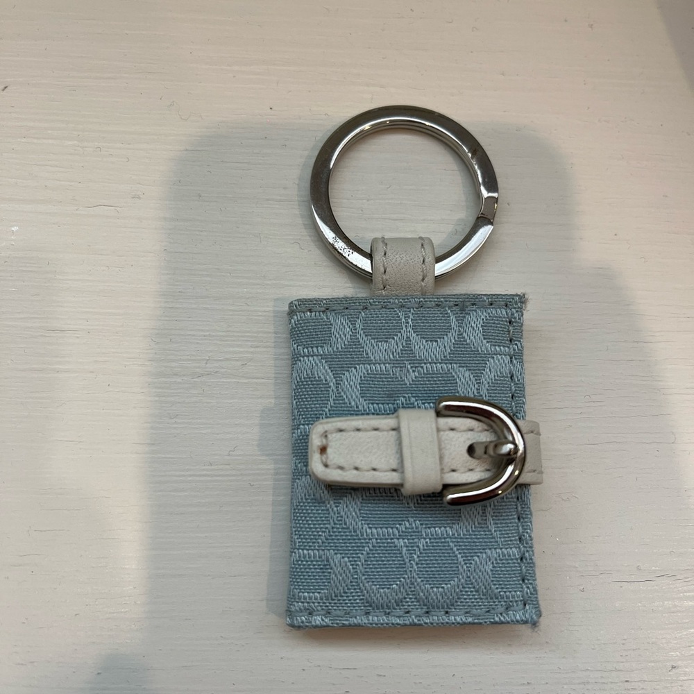 Coach keychain with 2 photo slots inside